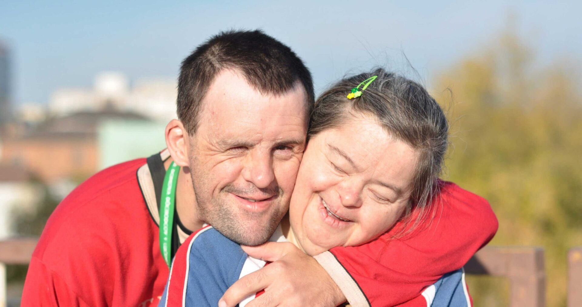 A picture of two smiling people
