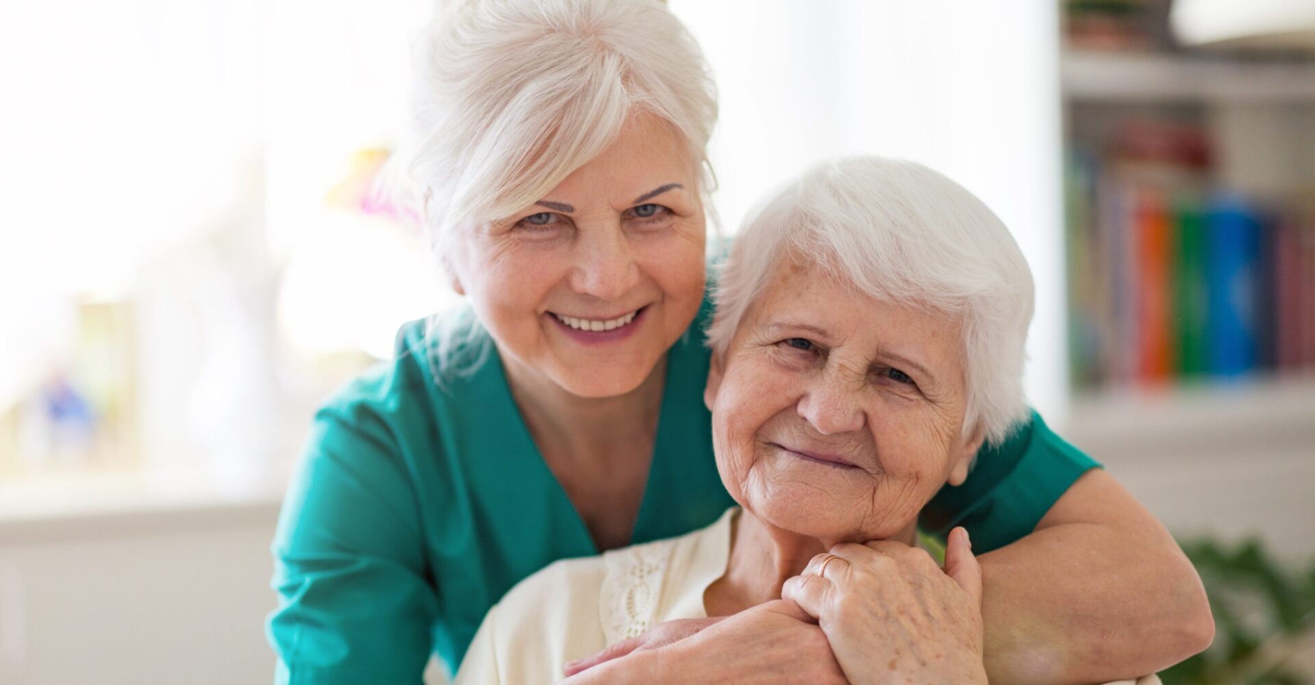A picture of elderly mother and older daughter