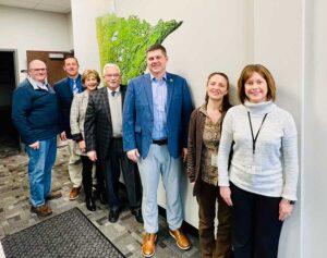 Congressman Brad Finstad pictured with South Country Health Alliance leadership